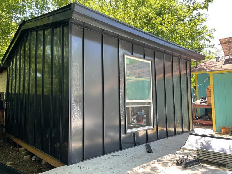 Black standing seam metal wall panels for Roof Inspection in Laurens